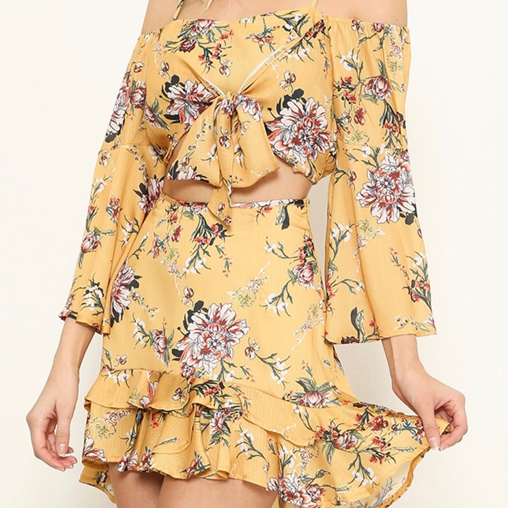 Two piece mustard floral style skirt set .